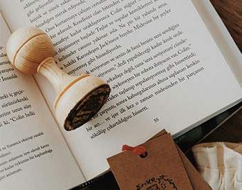 image of a circle book stamp placed on an open book