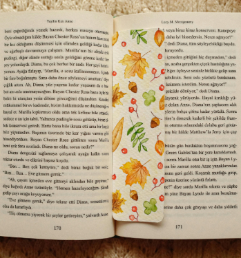 image of a white bookmark with a leafy pattern